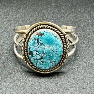 Turquoise bracelet. Stamped and signed.